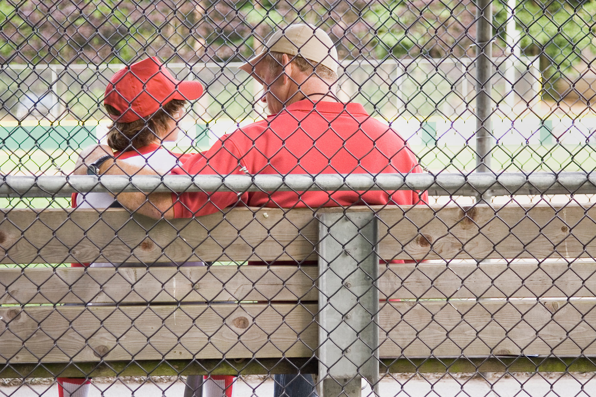 father-son-sitting-bleachers